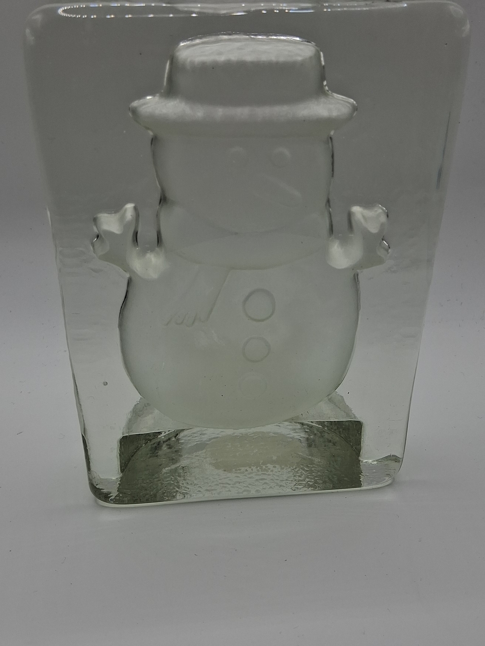 Snowman tea light candle holder from bed , bath and beyond. Heavy